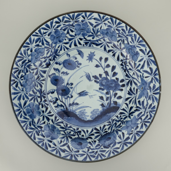 Large Platter Decorated with a Scene of Grasshoppers in a Garden