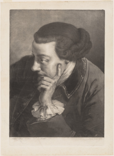 MAN RESTING HIS HEAD ON HIS HAND, FACING LEFT