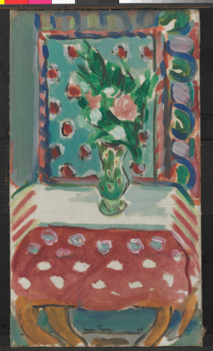 INTERIOR WITH VASE OF FLOWERS ON TABLE