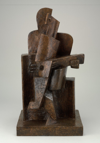 Seated Guitar Player