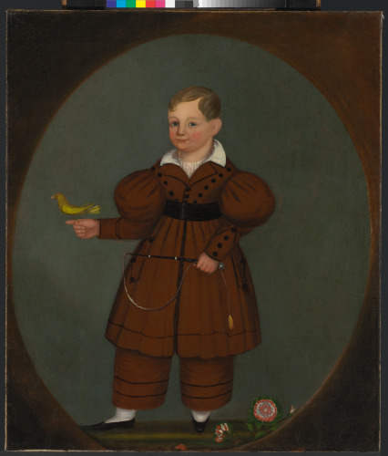 BOY IN BROWN JACKET WITH WHIP AND YELLOW BIRD