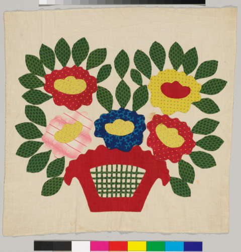 LARGE FLOWERS IN RED POT WITH GREEN LATTICE CENTER