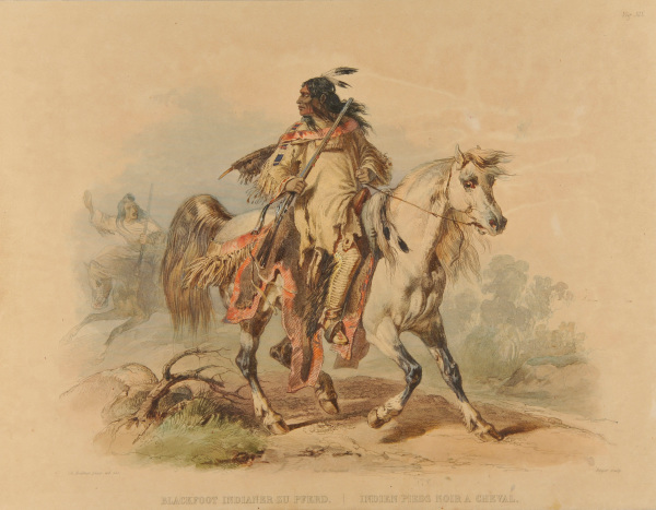 A BLACKFOOT INDIAN ON HORSEBACK