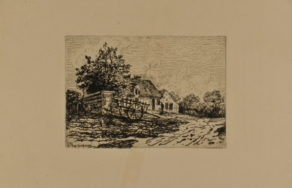 CART IN FRONT OF A FARM