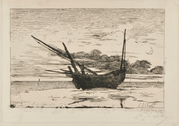 A FISHING BOAT ON THE BEACH