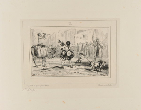 TRAVELLING PERFORMER WITH MONKEYS AND DOGS IN A TOWN CENTER