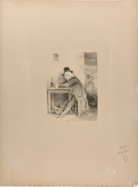 MAN SEATED AT A TABLE