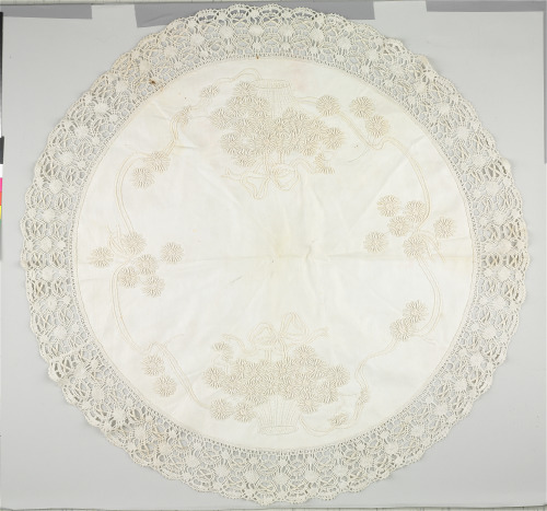 CENTERPIECE DECORATED IN CORD-WORK EMBROIDERY