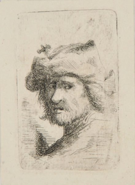 HEAD OF A MAN WITH SHORT BEARD, WEARING A CAP