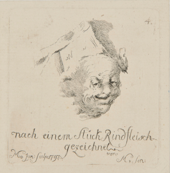 CARICATURE HEAD SKETCHED FROM A PIECE OF BEEF