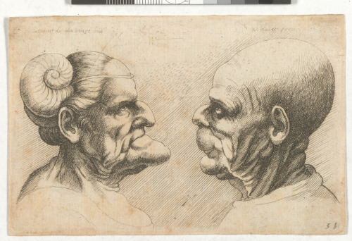 TWO DEFORMED HEADS FACING EACH OTHER