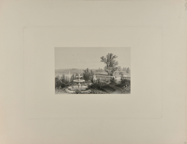 A PARK WITH FOUNTAIN BY A LAKE