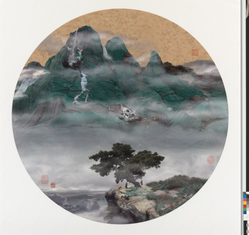 VIEW OF WATERFALL WITH ROCKS AND PINES