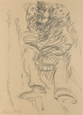 Man Seated in a Patterned Chair Reading