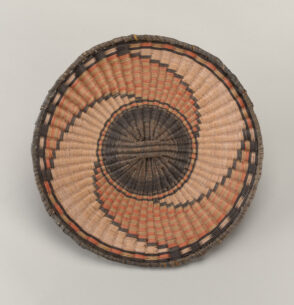 Plaque with whirlwind design