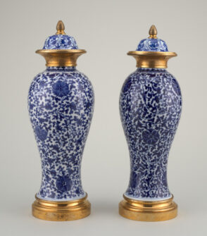 Covered Vase Decorated with Overall Flower and Vine Scroll Motif and Mount