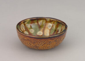 Small Bowl with Molded Persian-Style Leafy Vine Design