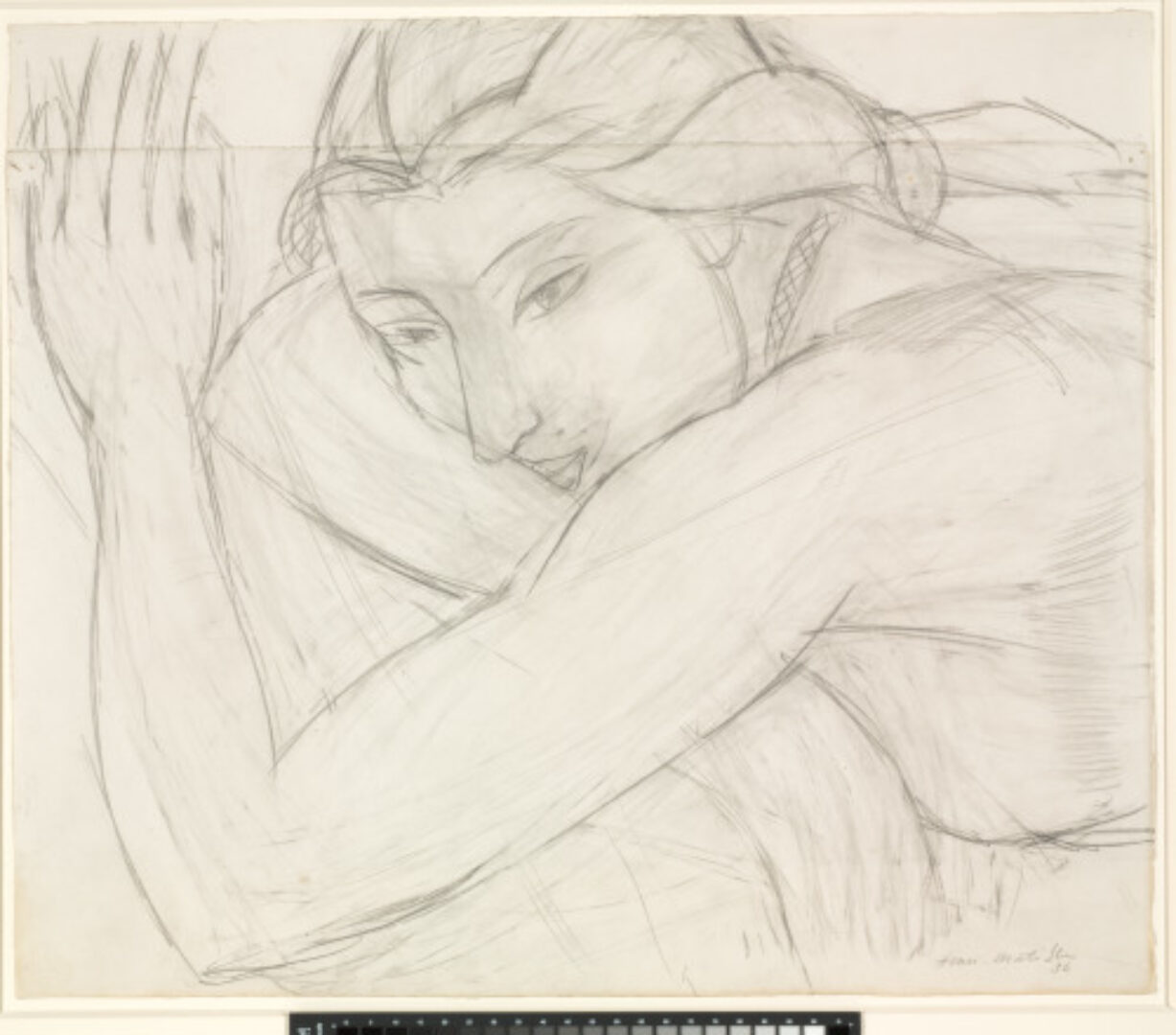 MODEL RESTING ON HER ARMS