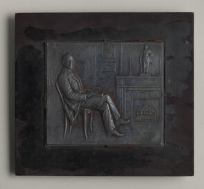 “Scene of a Man Seated Before a Fireplace” Plaquette