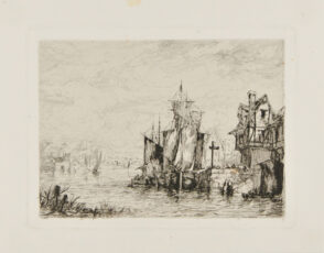 Ships docked at a village pier