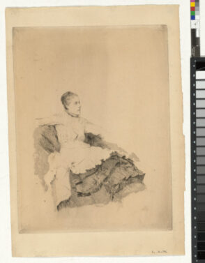 Woman seated with her arms on the back of the couch