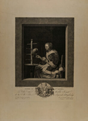 A Young Woman Feeding a Parrot