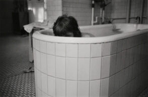Mary Frances Peeking from Tub, Ward 81, Oregon State Hospital, Salem, Oregon